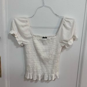 Smocked puff sleeve, waffle, knit blouse with ruffle from aqua in size small